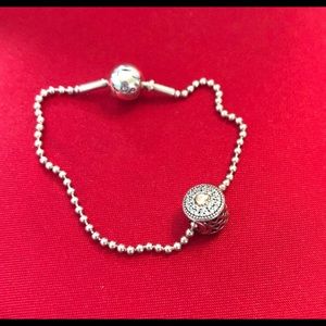 Pandora bracelet and affection charm.